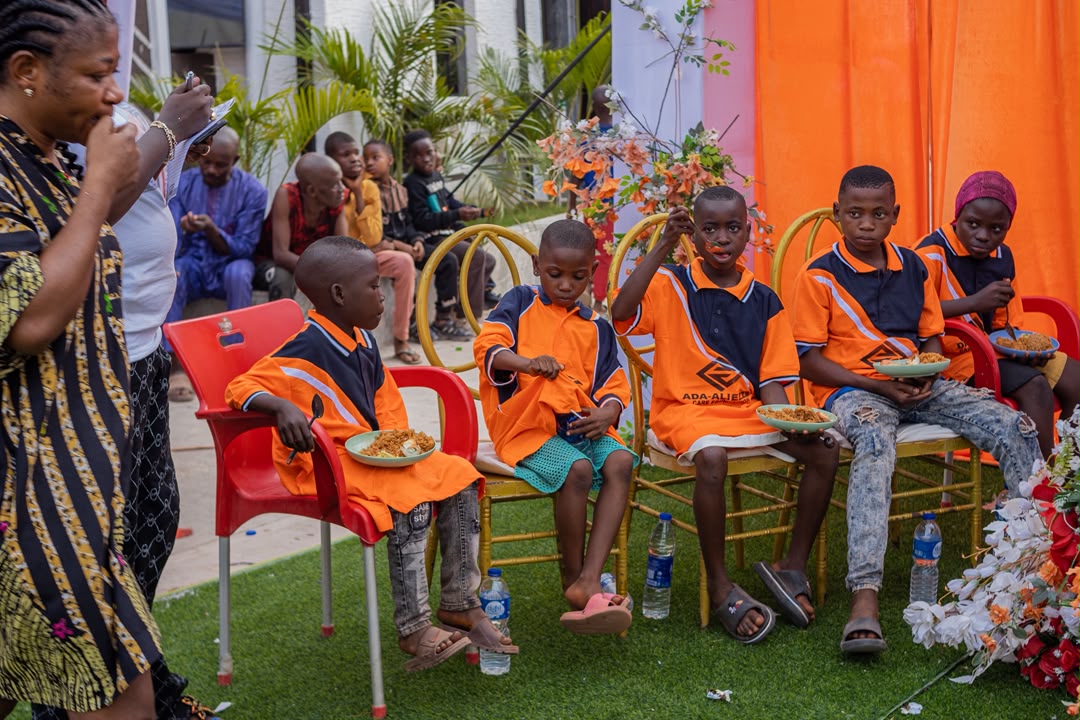 Children sharing a meal at an AACF community event